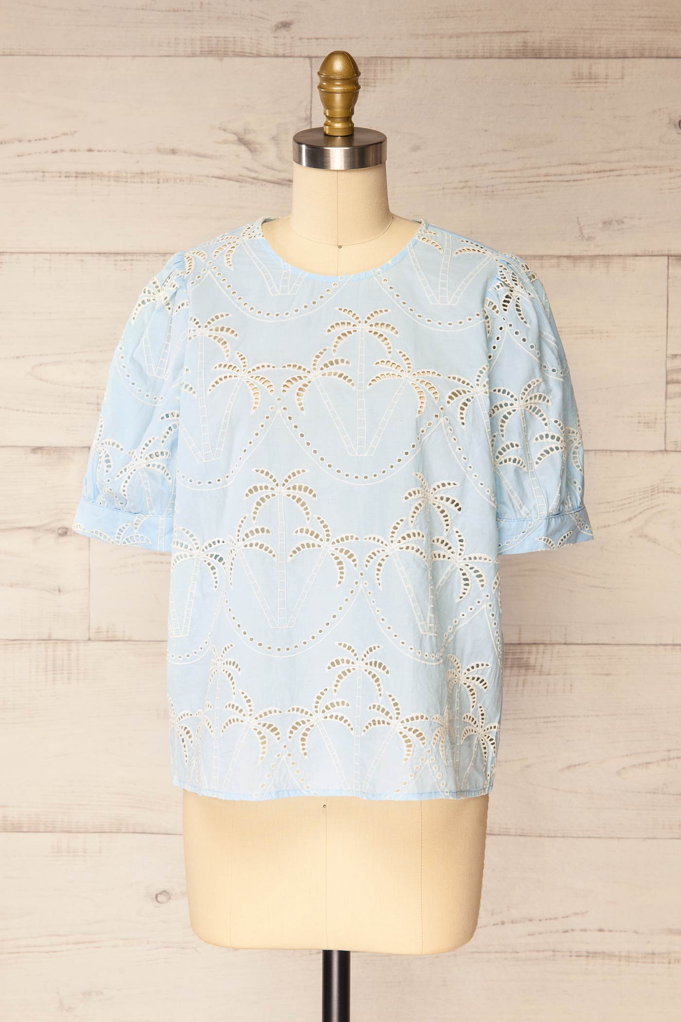 Frontview of Jadra Blue Blouse with palm design at la petite garçonne