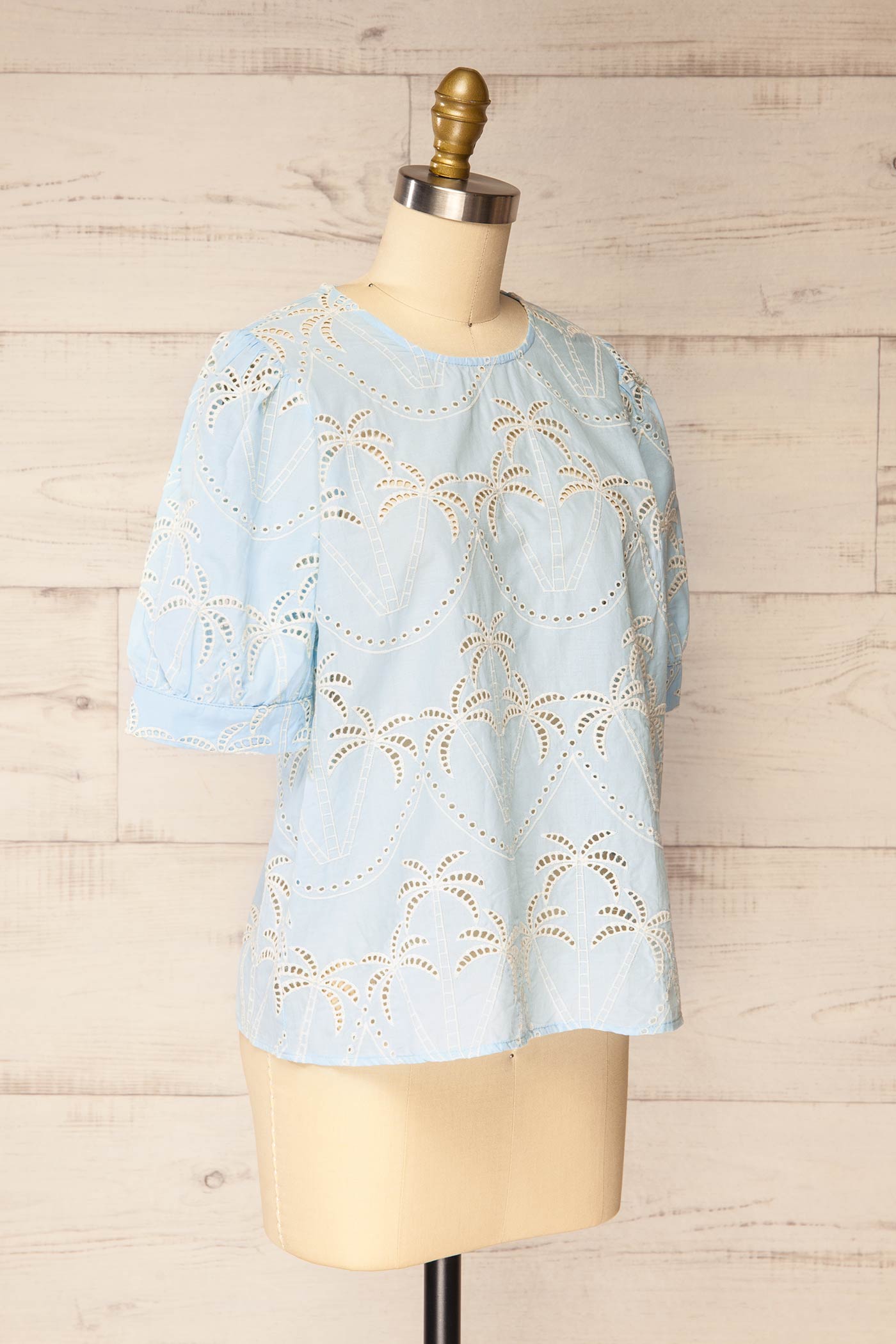 Sideview of Jadra Blue Blouse with palm design at la petite garçonne