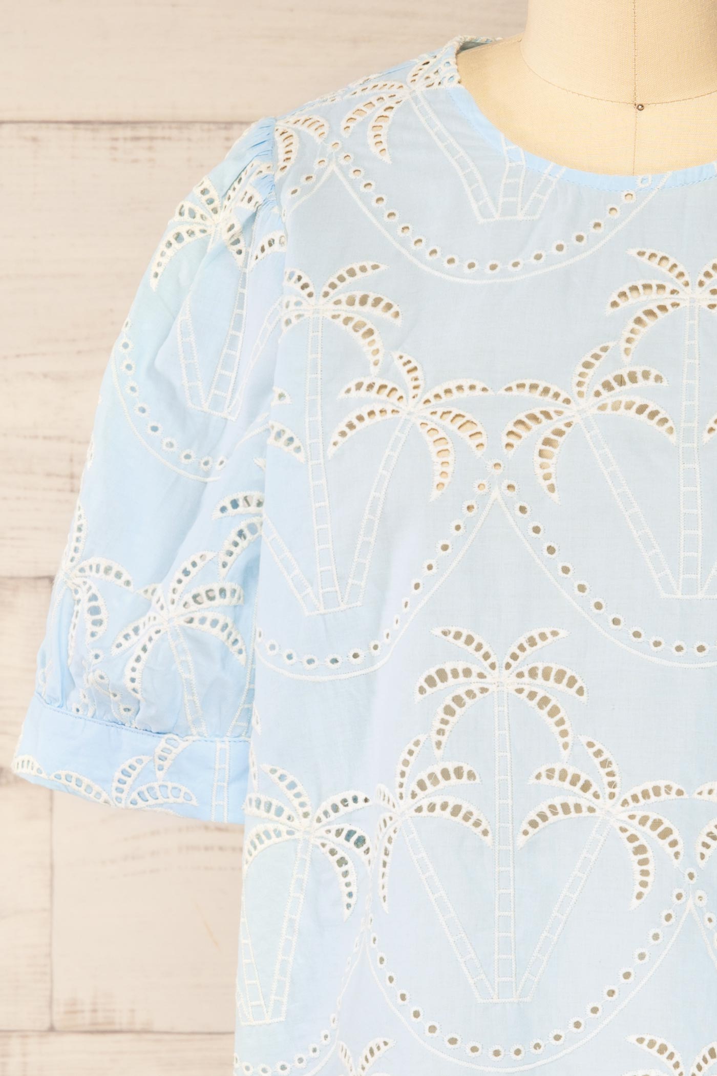 Close-up Jadra Blue Blouse with palm design at la petite garçonne