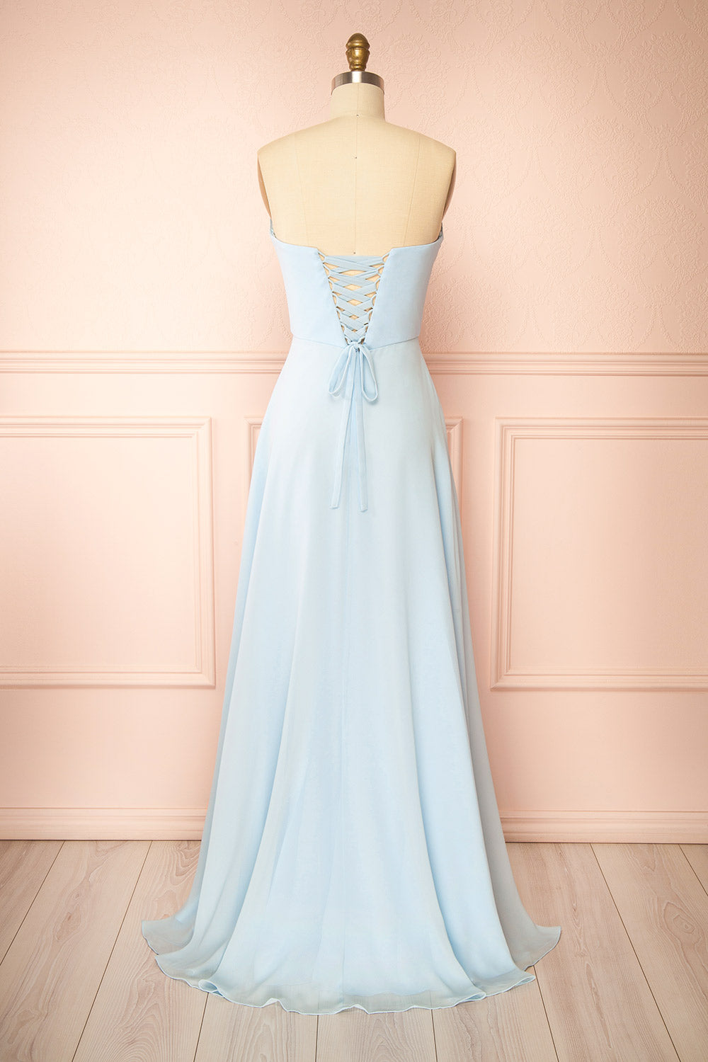 back view of a sewing mannequin wearing Janie Light Blue Chiffon Maxi Dress with Sweetheart Neckline from Boutique 1861
