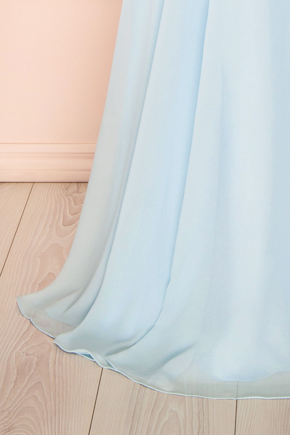 bottom of a sewing mannequin wearing Janie Light Blue Chiffon Maxi Dress with Sweetheart Neckline from Boutique 1861