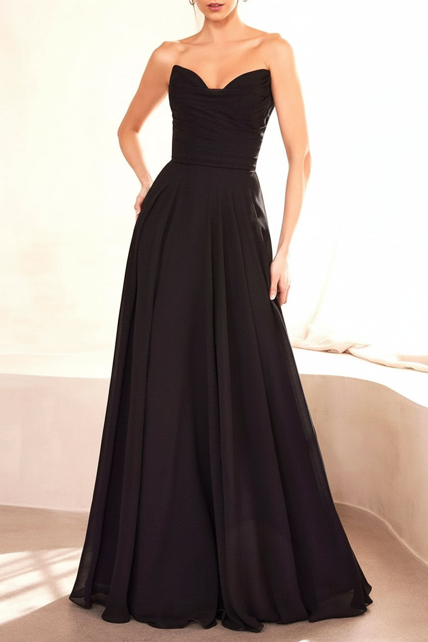 Person wearing Janie Black Chiffon Maxi Dress with Neck Scarf from Boutique 1861 backview