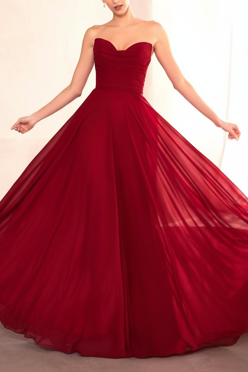 Person wearing Janie Burgundy Chiffon Maxi Dress with Neck Scarf from Boutique 1861 front view