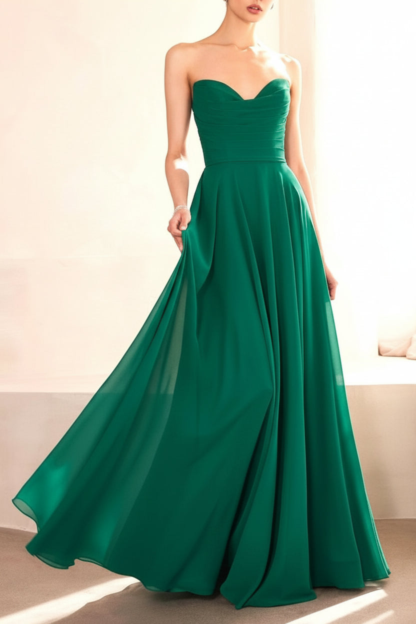Person wearing Janie Emerald Chiffon Maxi Dress with Neck Scarf from Boutique 1861 backview