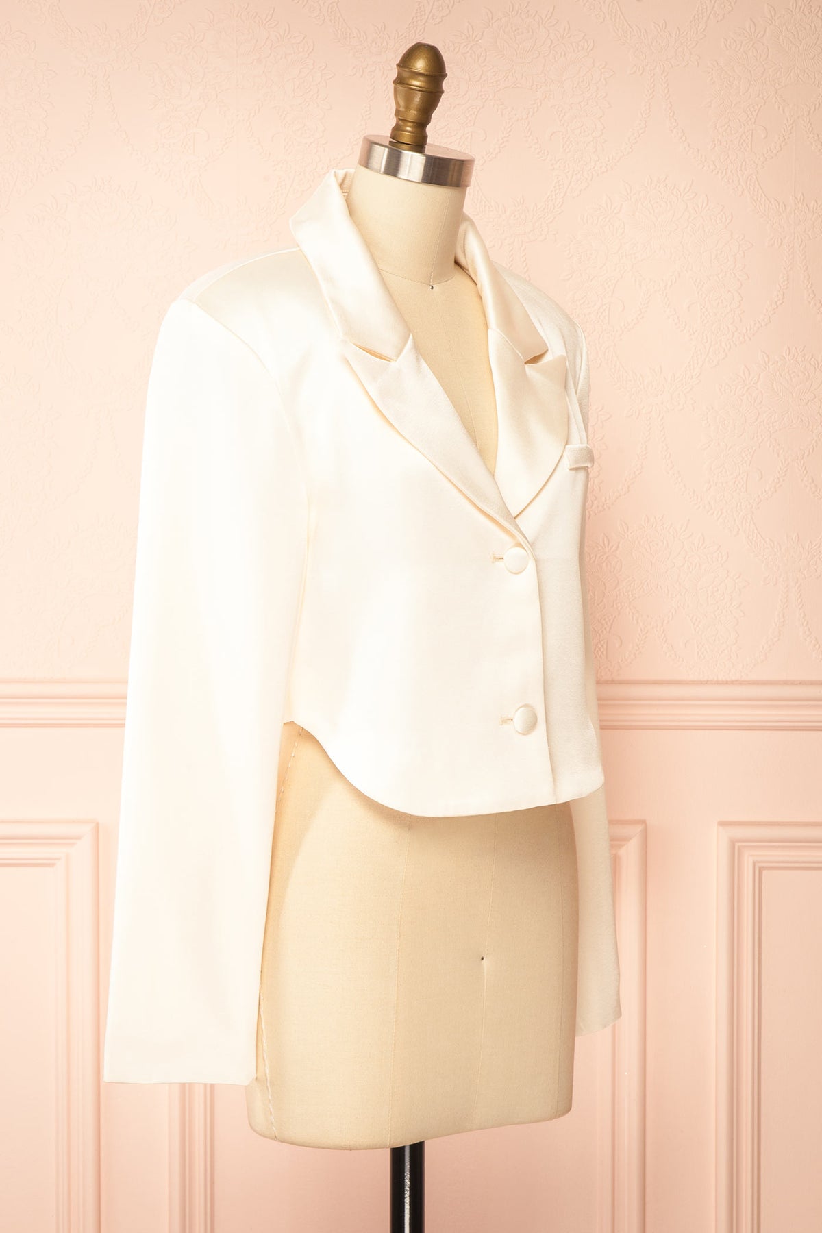 Side view of Jeanilia Ivory Cropped Satin Blazer at Boutique 1861