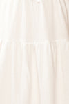 Jenna Short Tiered White Dress | Boutique 1861 texture