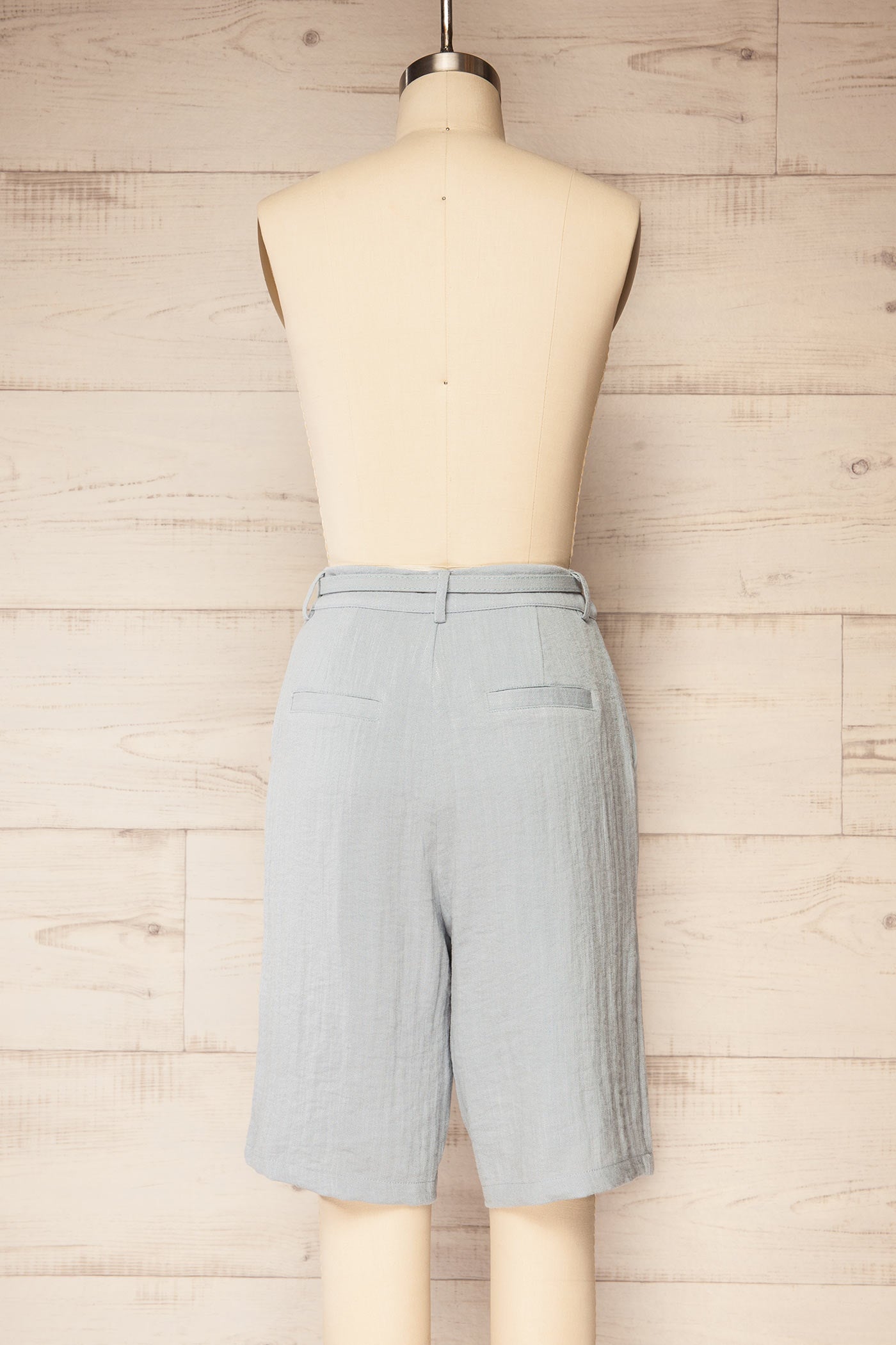 Backview of Jharia High-Waisted Blue Shorts with Belt at la petite garçonne