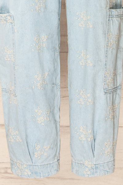 Jorah Denim Jumpsuit w/ Floral Embroidery | La petite garçonne bottom close-up