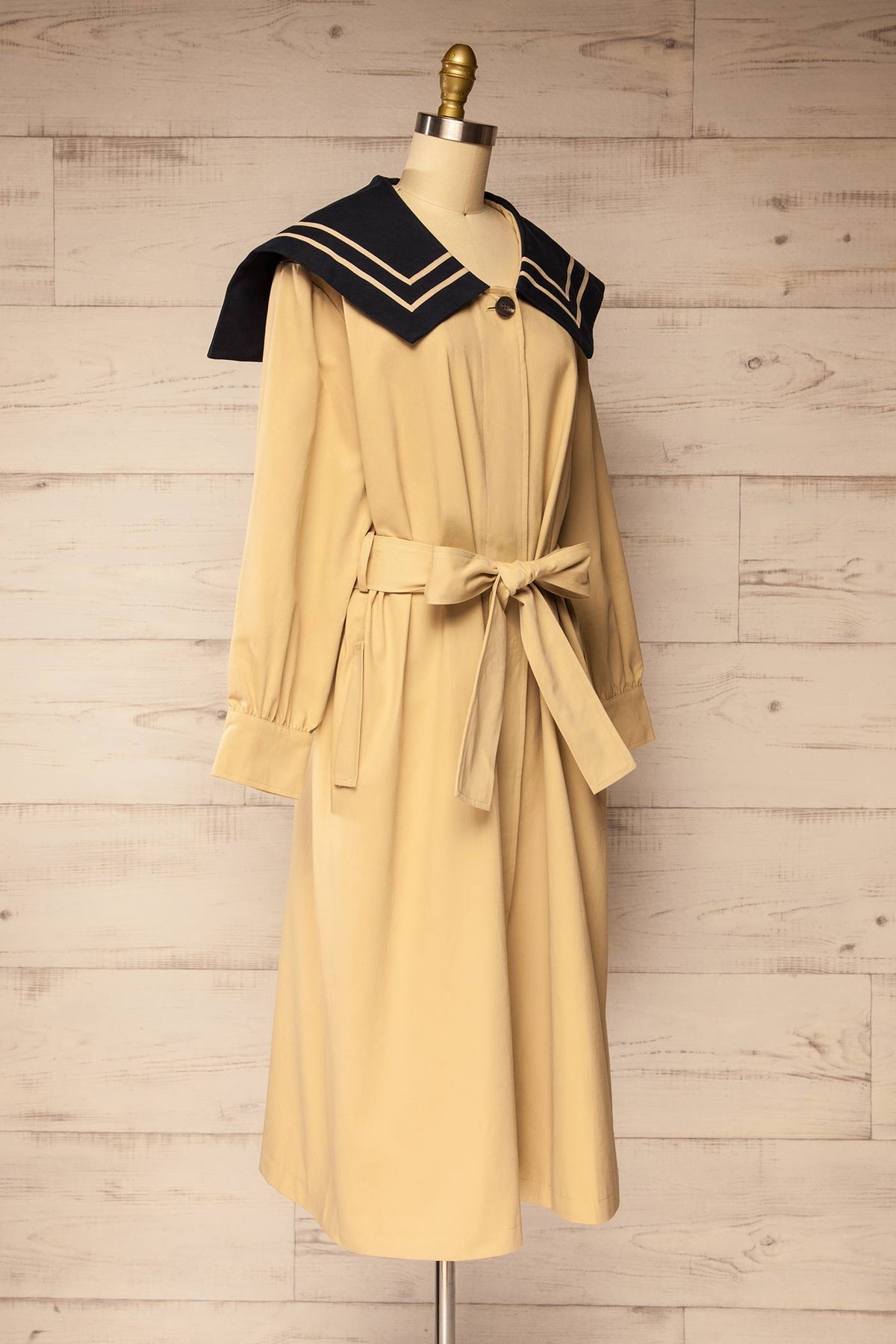 side view of Juruti Beige Sailor Collar Long Trench Coat with Belt at La petite garçonne