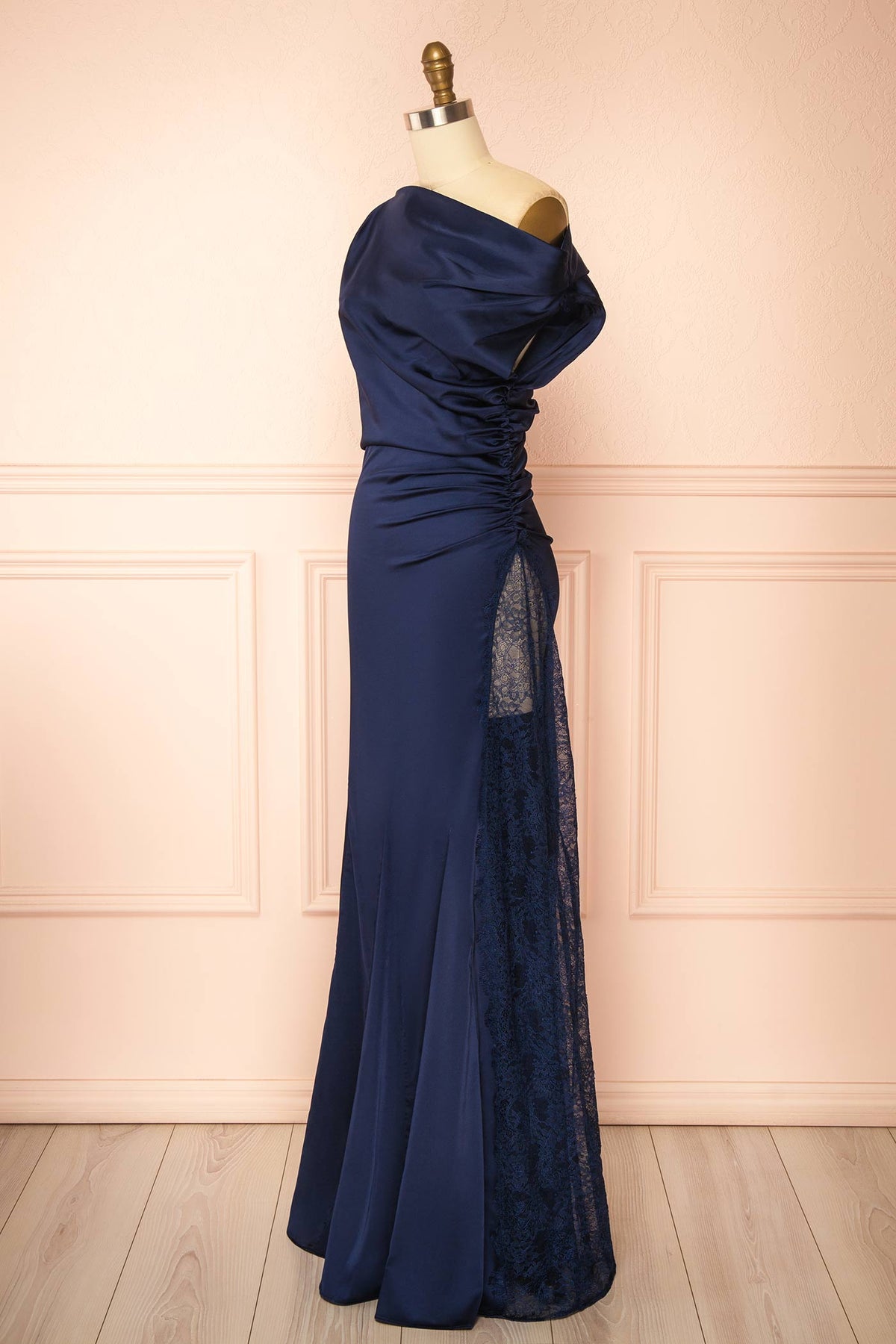 Side view of Kaede Navy Maxi Satin Dress with High Lace Inset at Boutique 1861