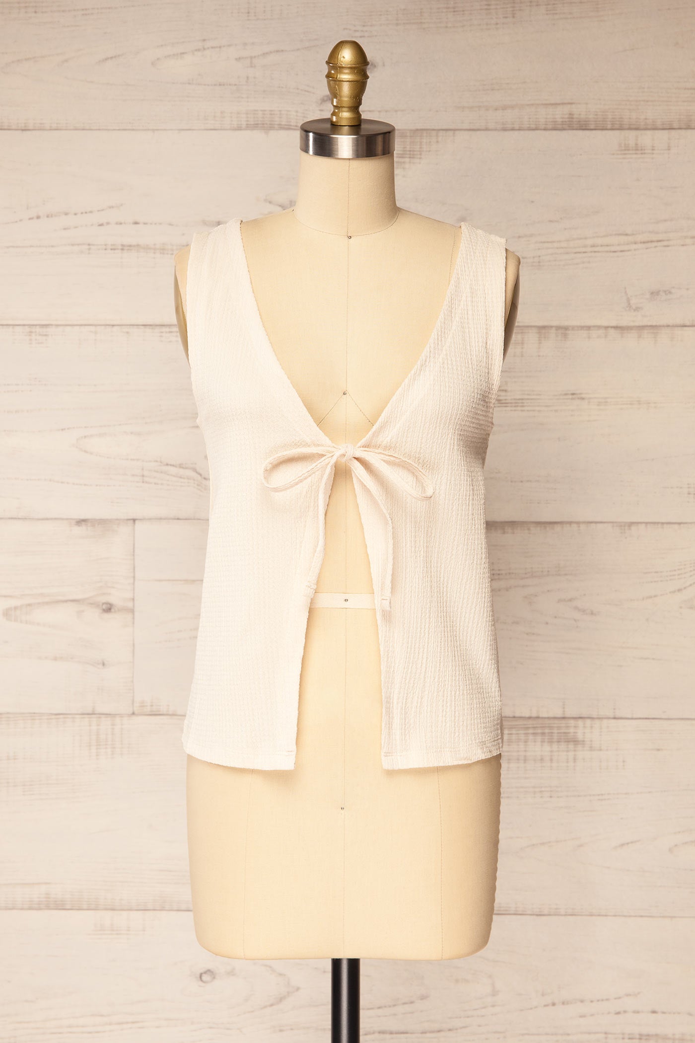 Front view Kannur Ivory Textured Tie-Front Sleeveless Top at la petite garçonne