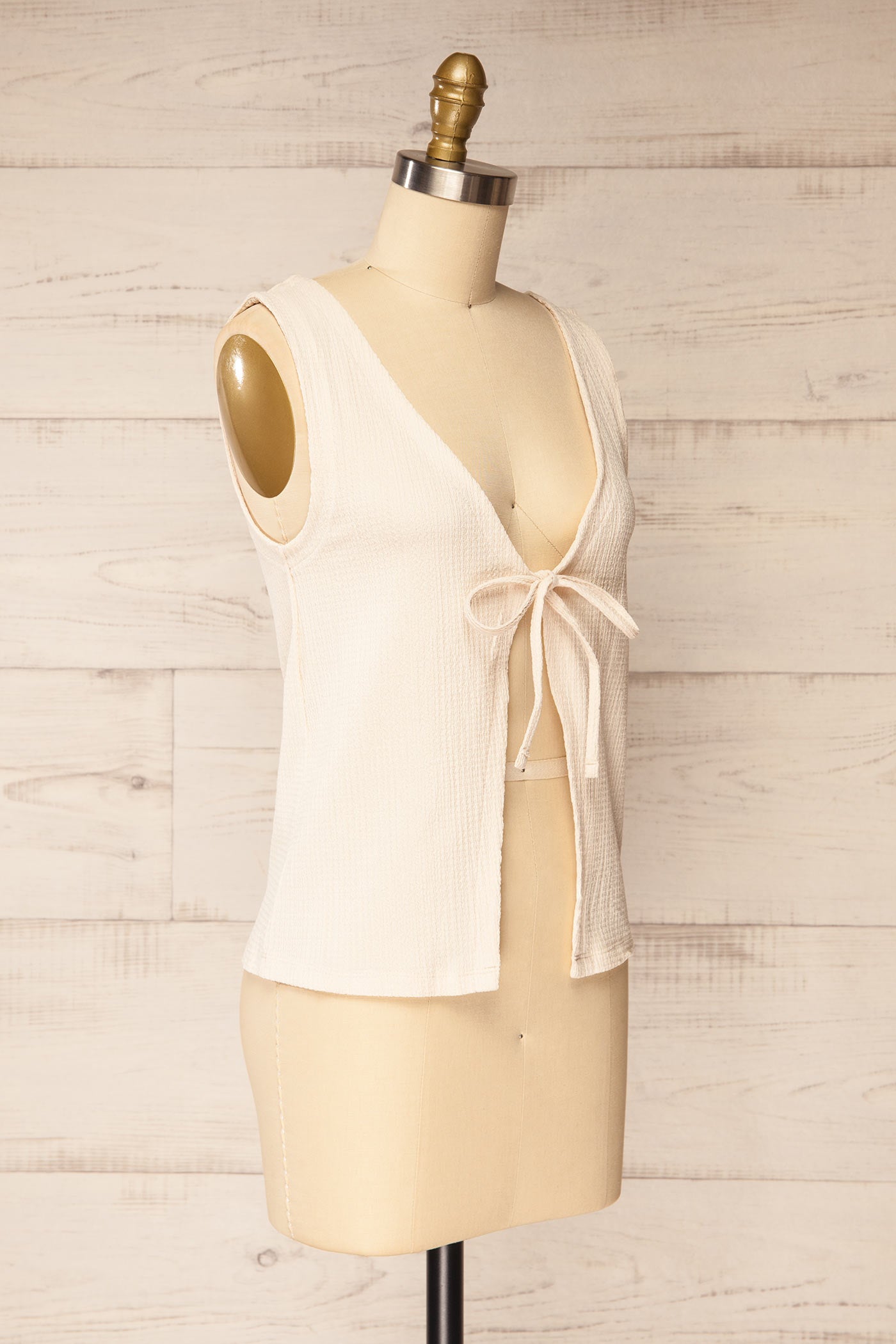 Profile view Kannur Ivory Textured Tie-Front Sleeveless Top at la petite garçonne