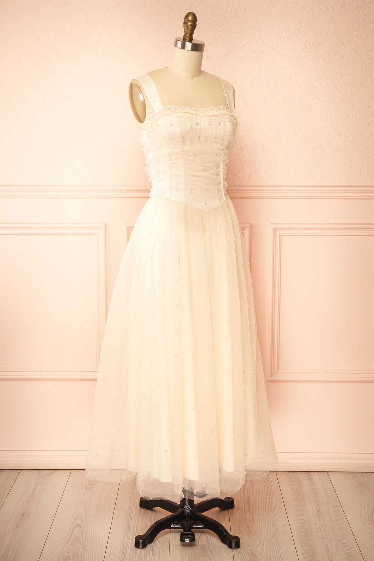 Side view of Kaska Ivory Midi Tulle Dress with Pearls at Boutique 1861 