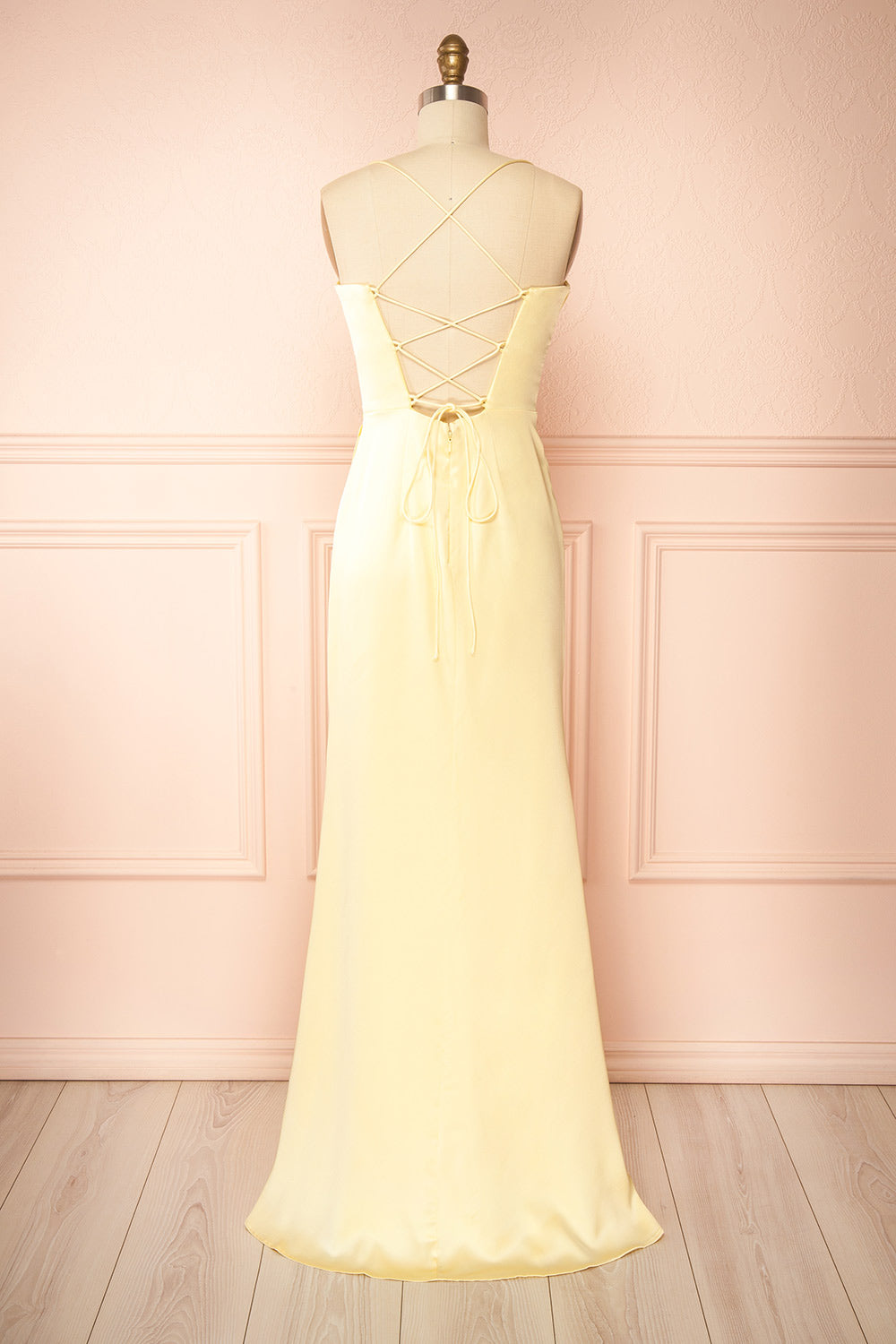 back view of sewing mannequin wearing Kesha Light Yellow Corset Cowl Neck Maxi Dress | Boutique 1861