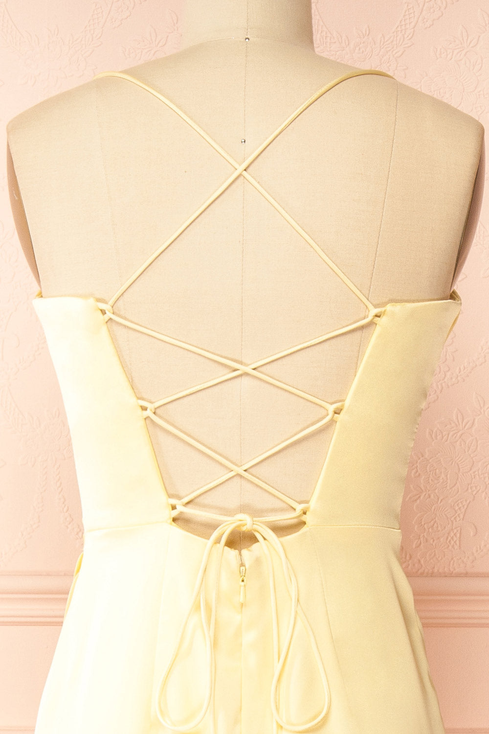 back of sewing mannequin wearing Kesha Light Yellow Corset Cowl Neck Maxi Dress | Boutique 1861