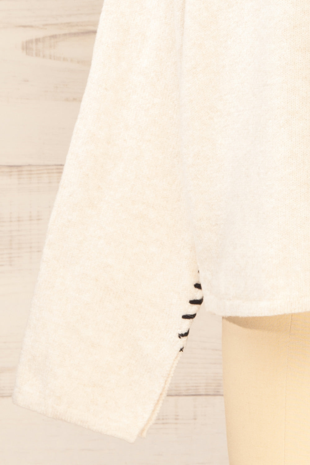 Kofu Ivory Sweater w/ Exposed Stitching | La petite garçonne sleeve