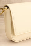 Laryssa Ivory Vegan Leather Crossbody Bag | La petite garçonne side close-up