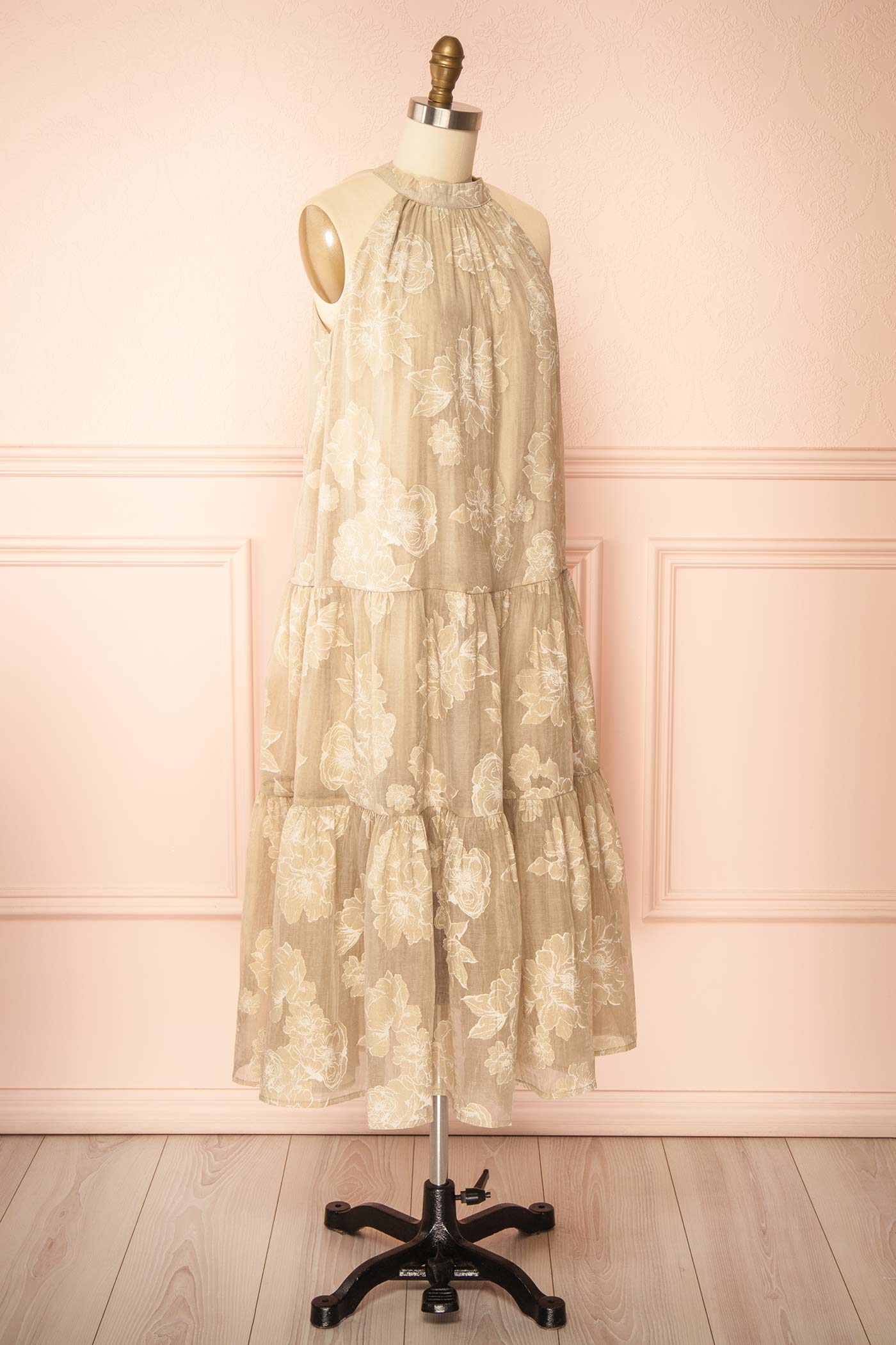 Sideview of Laurelgrove Long Halter Neck Floral Beige Dress at boutique 1861