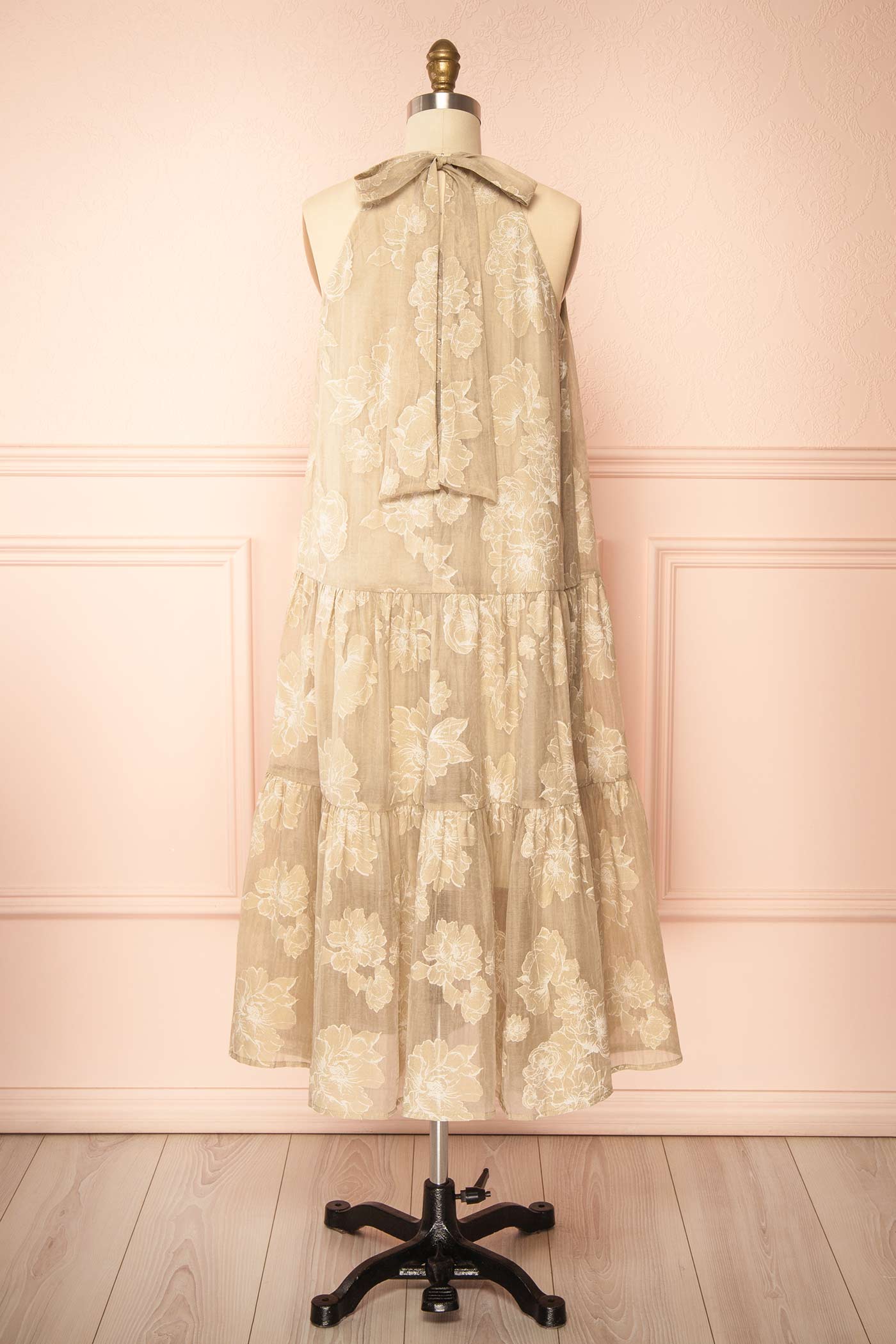 Backview of Laurelgrove Long Halter Neck Floral Beige Dress at boutique 1861