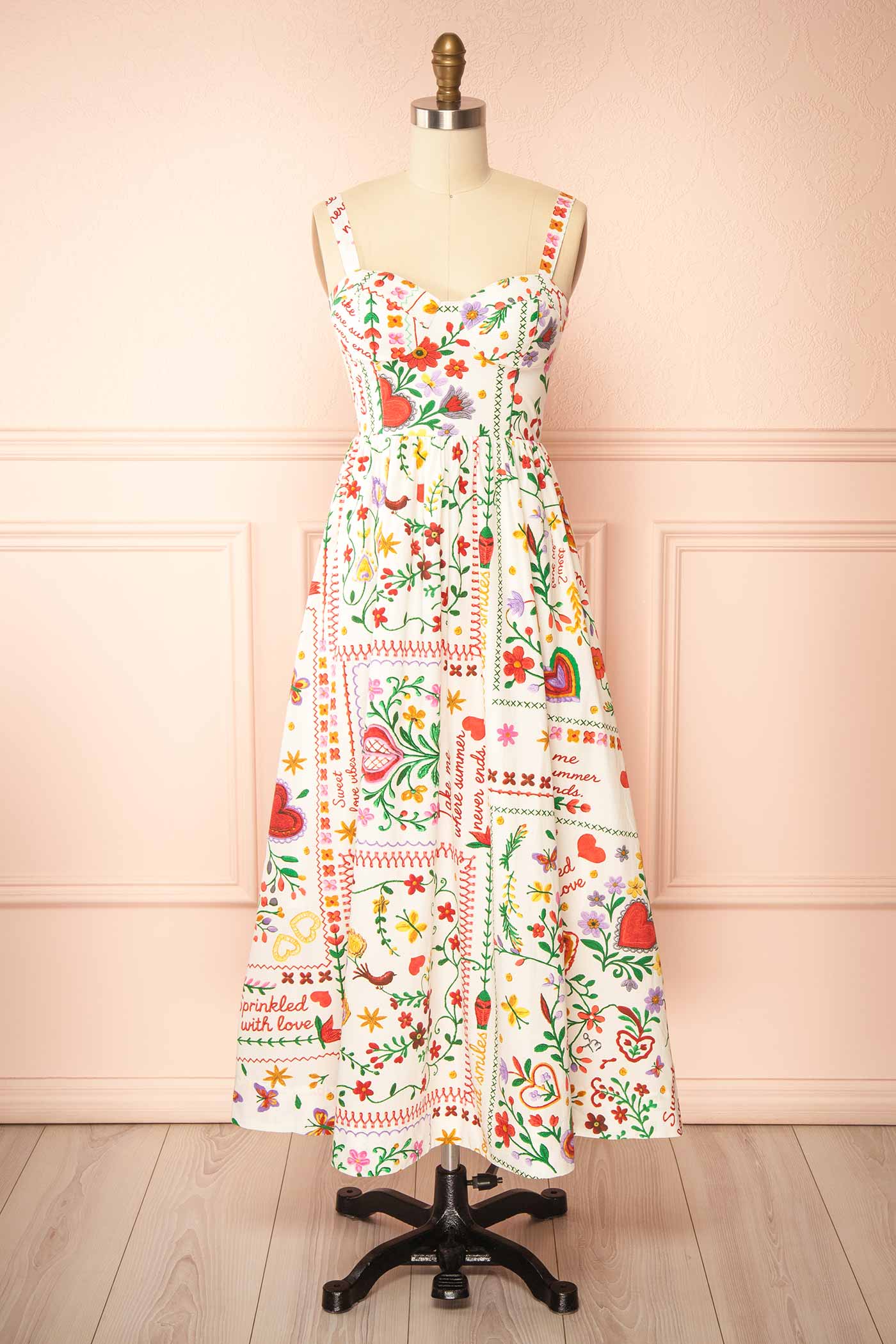 Front view Lauria White Folk-Art Floral Print Smocked Midi Dress at boutique 1861