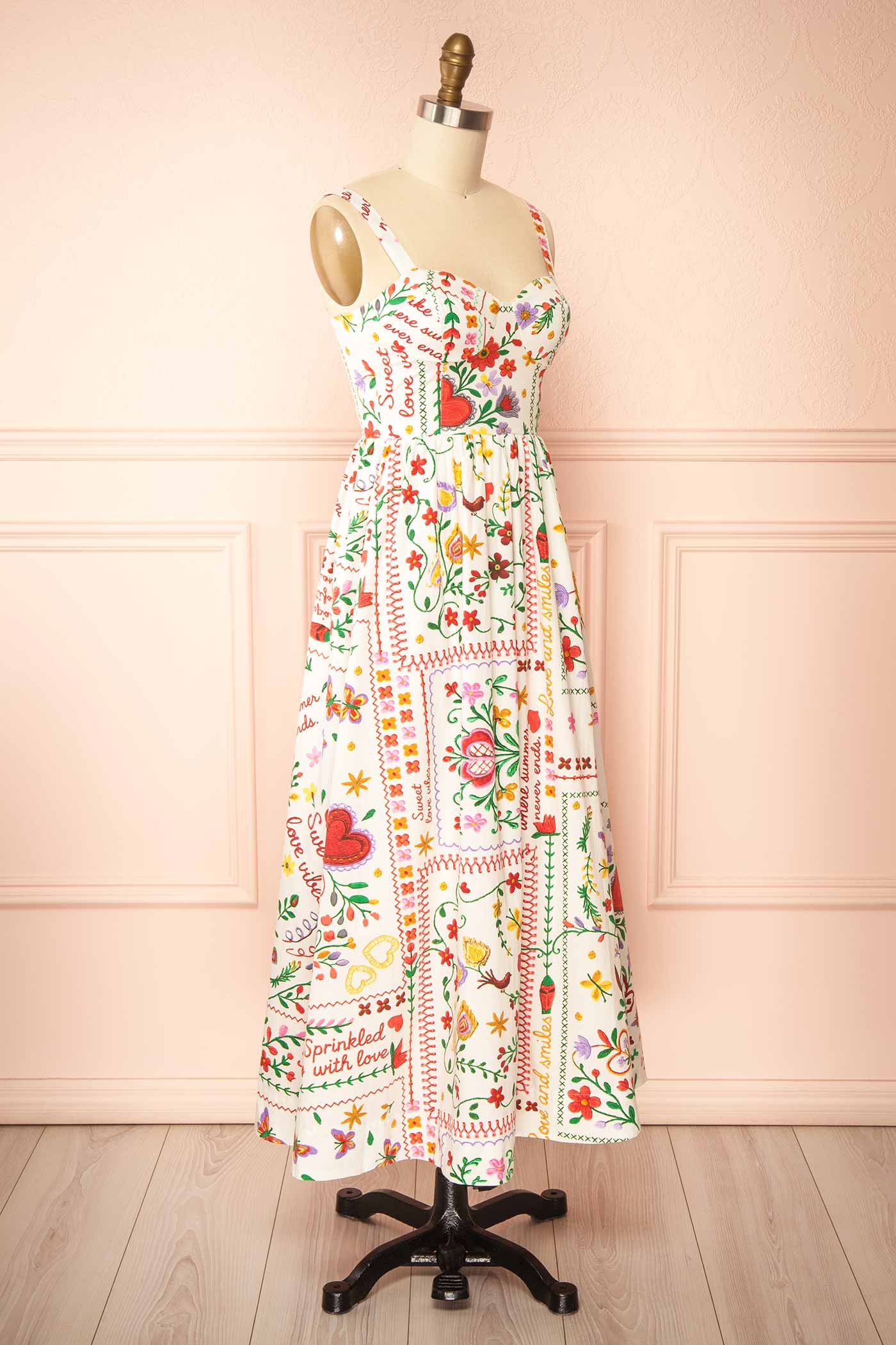 Profile view Lauria White Folk-Art Floral Print Smocked Midi Dress at boutique 1861