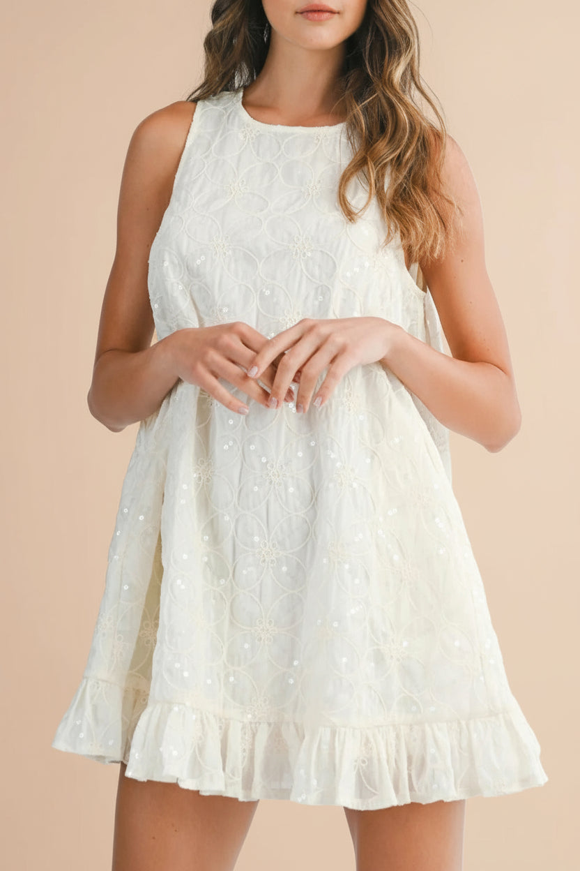 Lelia Ivory Short Sleeveless Dress | Boutique 1861 front model