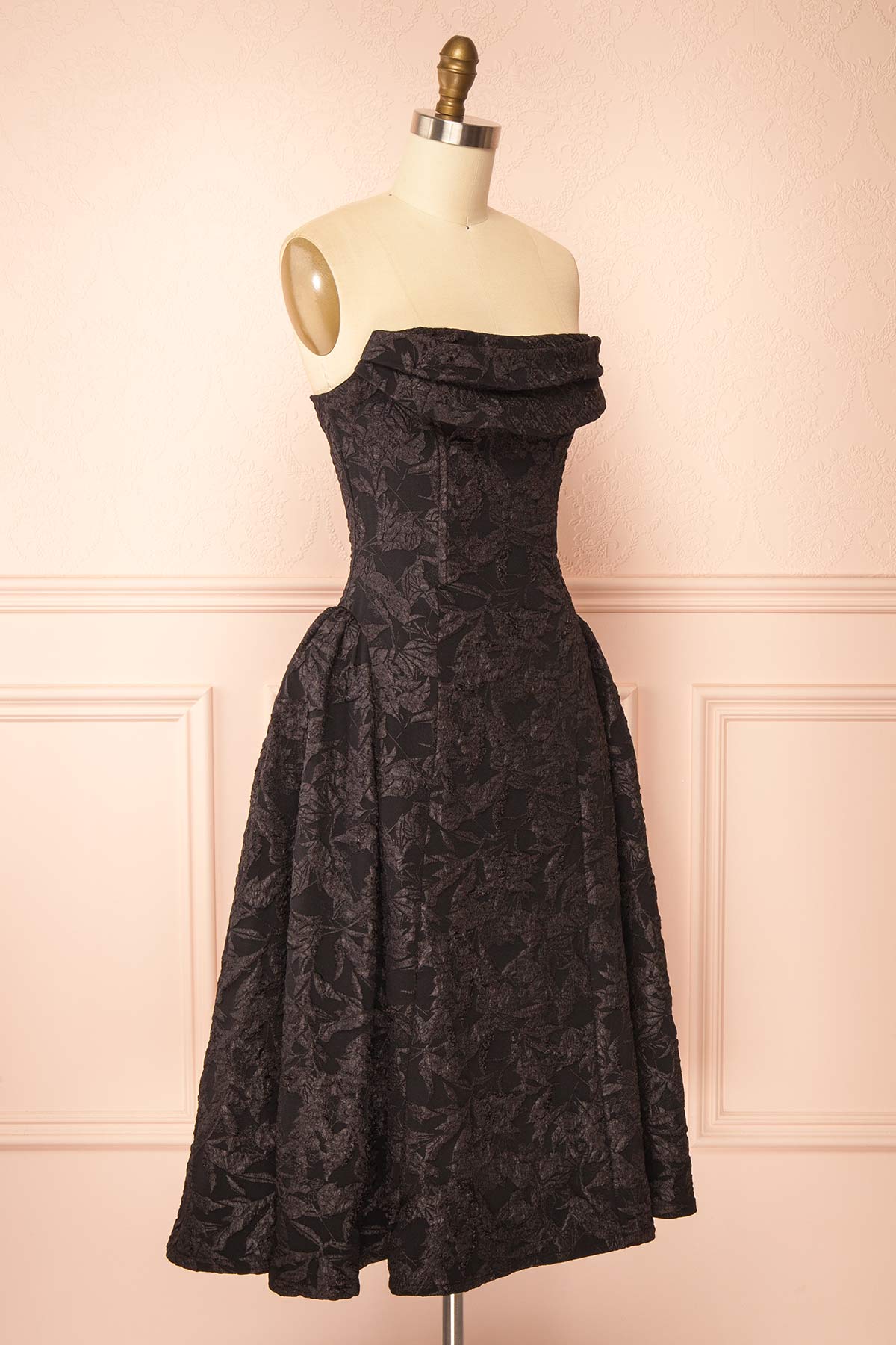 Side view of Liliah Black Strapless Midi Corset Dress at Boutique 1861 