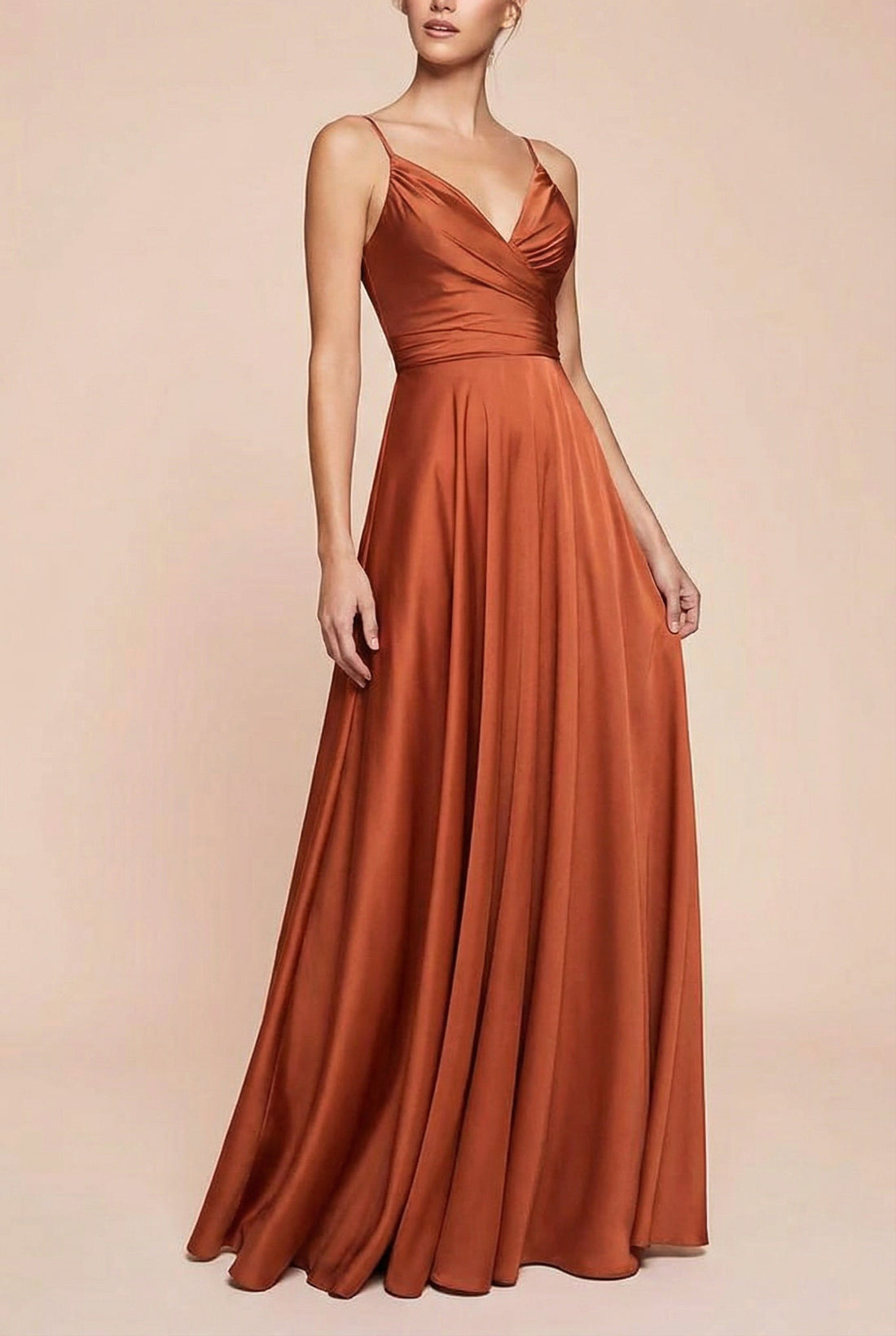 Frontview of a woman wearing Lizza Rust Satin Maxi Dress with a Slit from Boudoir 1861 