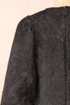 Lyrilla Short Loose Embroidered Black Dress | Boutique 1861 back close-up