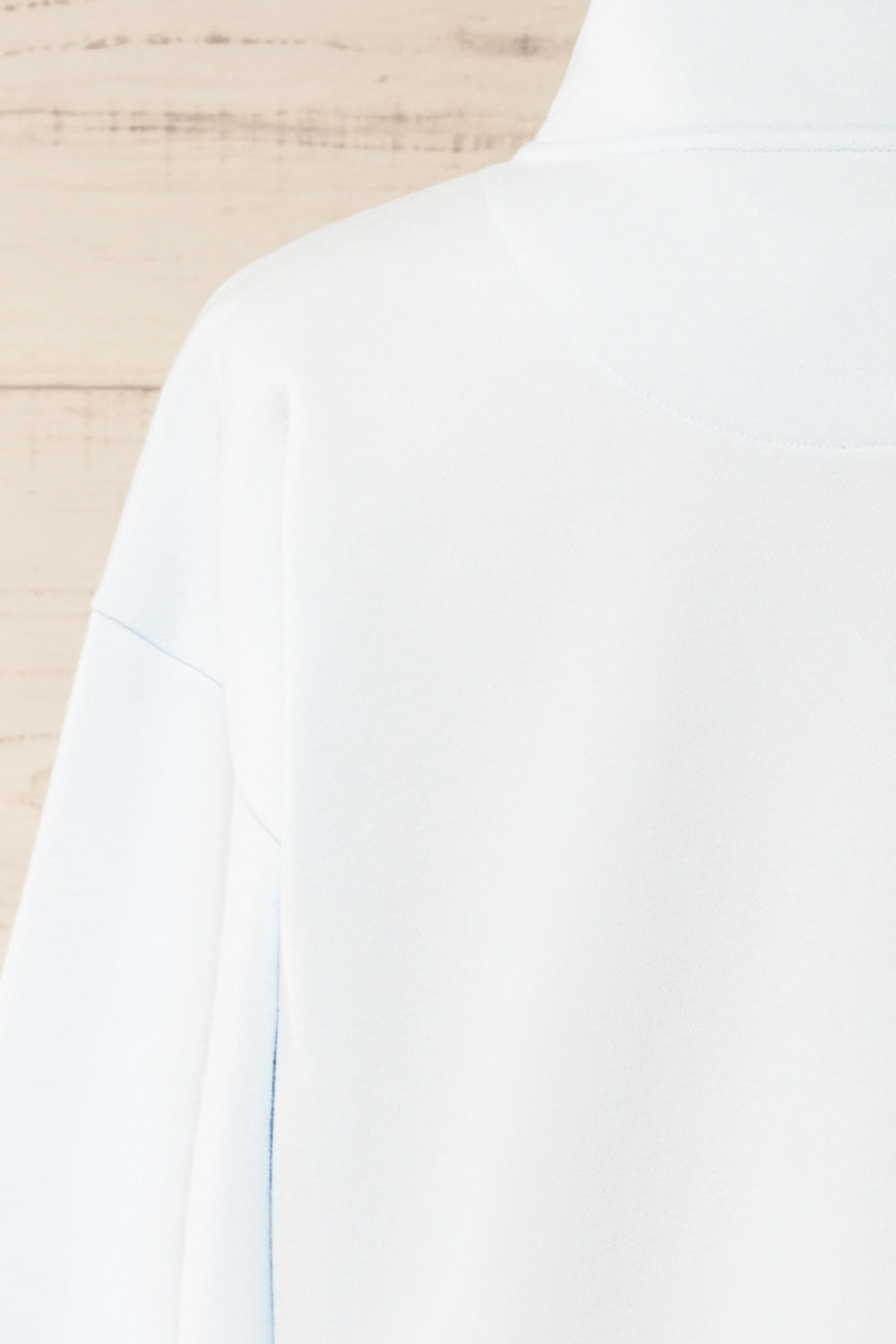 Madurai Light Blue Cropped Quarter-Zip Sweatshirt | La petite garçonne back