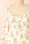 Maelis Short Ivory Floral Dress w/ 3/4 Sleeves | Boutique 1861 front close-up