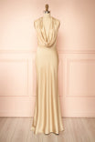 front view of Maka Champagne Satin Maxi Dress with Open Back at Boutique 1861 