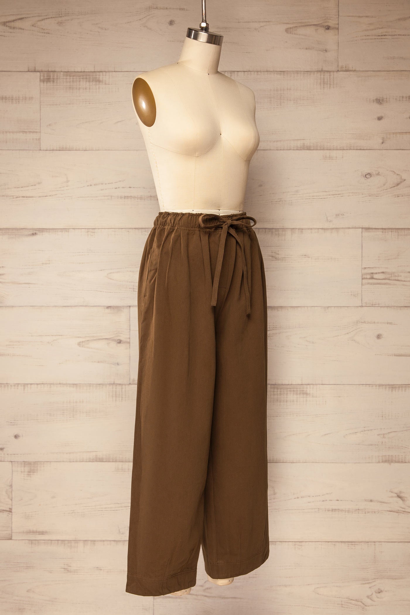 side view of Malegaon Brown High-Waisted Cropped Pants with Drawstring at La petite garçonne
