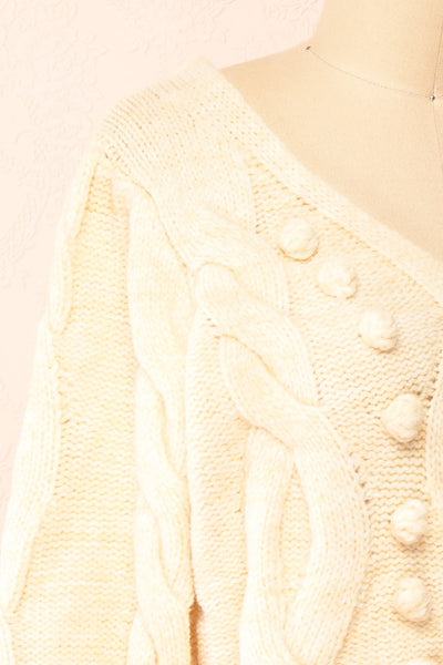 Maloune Beige Sweater w/ Pompoms | Boutique 1861 side close-up