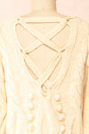 Maloune Beige Sweater w/ Pompoms | Boutique 1861 back close-up