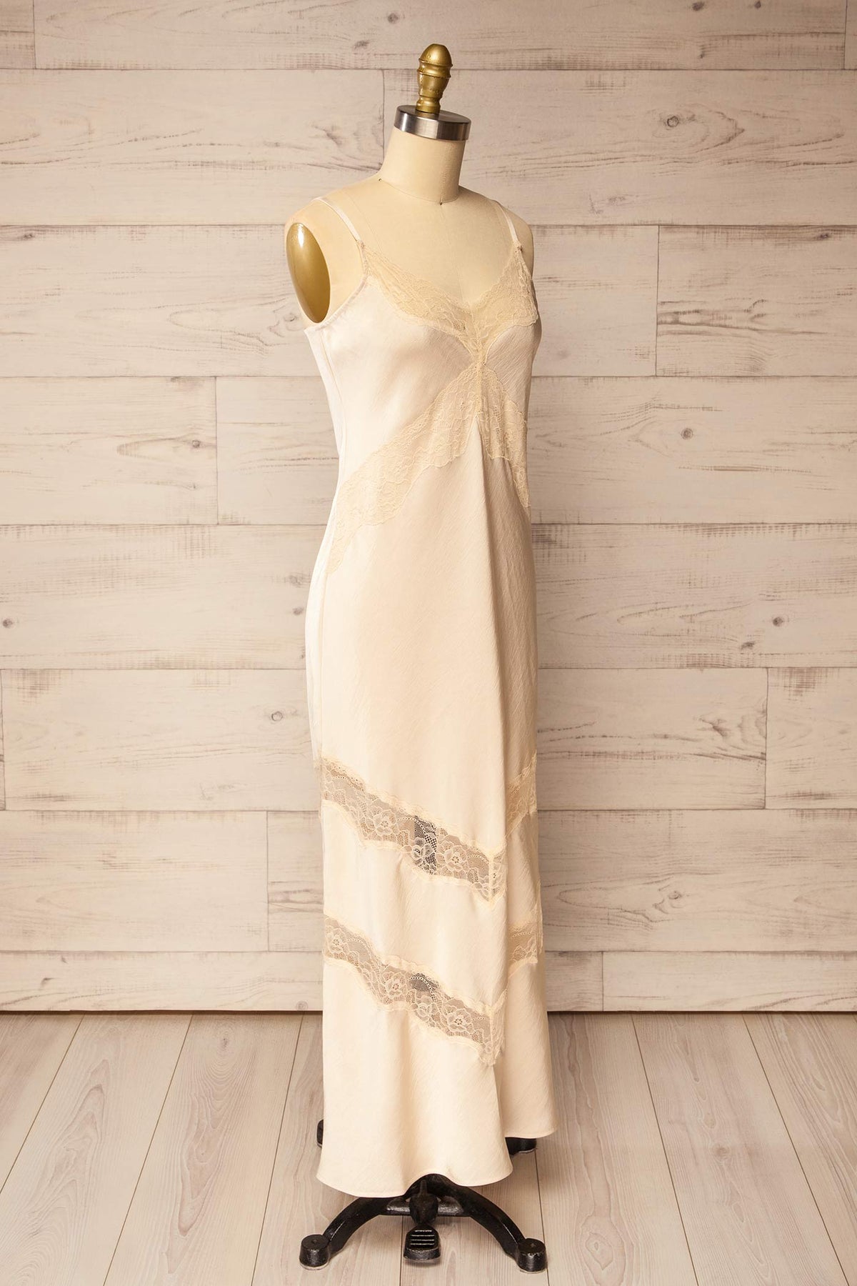 side view of Manikanis Beige Satin Midi Dress with Lace at La petite garçonne