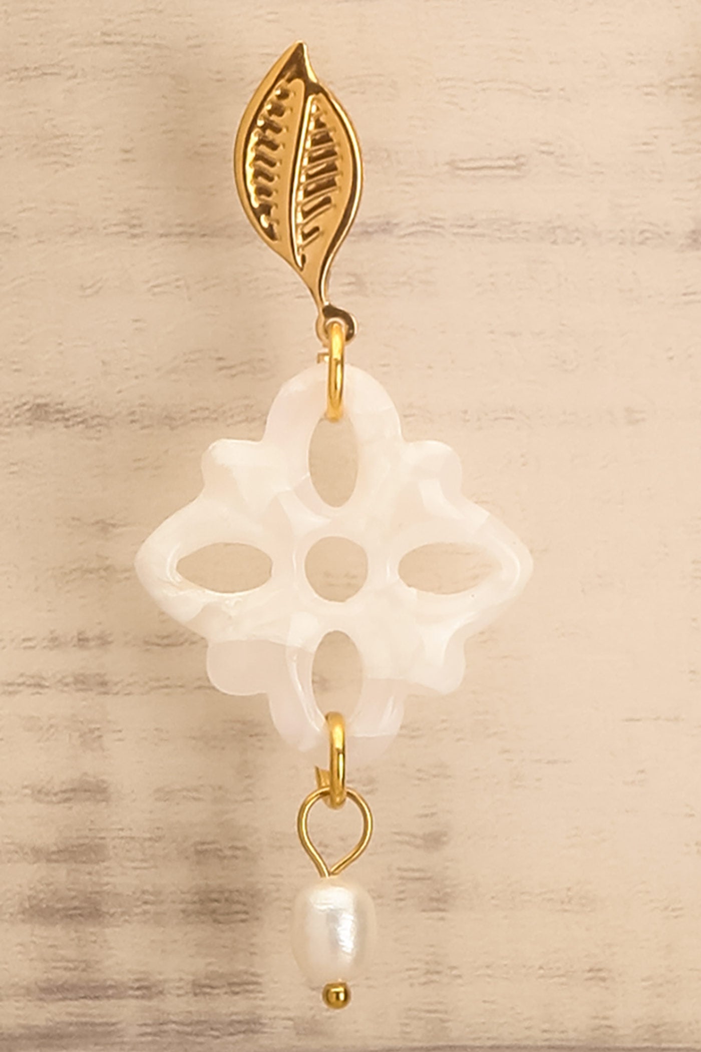 Mansi Gold Drop Earrings with Leaf Studs | La petite garçonne close-up