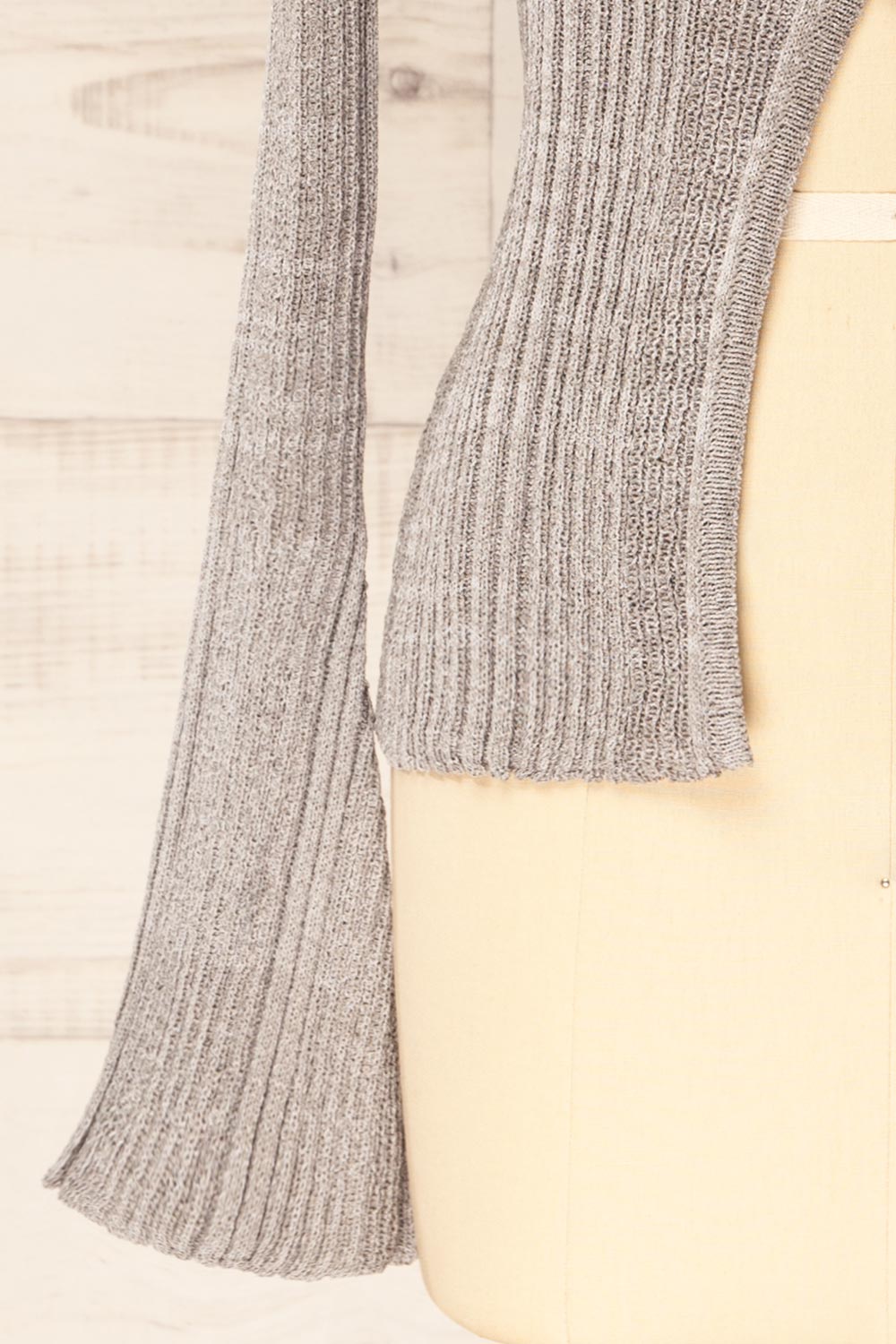 sleeve of sewing mannequin wearing Marrit Ribbed Grey Top with Plunging Neckline from La petite garçonne
