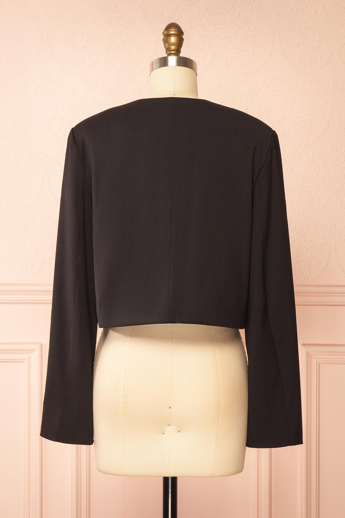 Back view of Meera Black Cropped Blazer with Flower Buttons at Boutique 1861