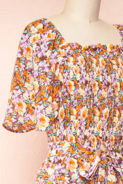 Merla Orange Floral Jumpsuit w/ Belt | Boutique 1861 side close-up