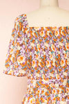 Merla Orange Floral Jumpsuit w/ Belt | Boutique 1861 back close-up