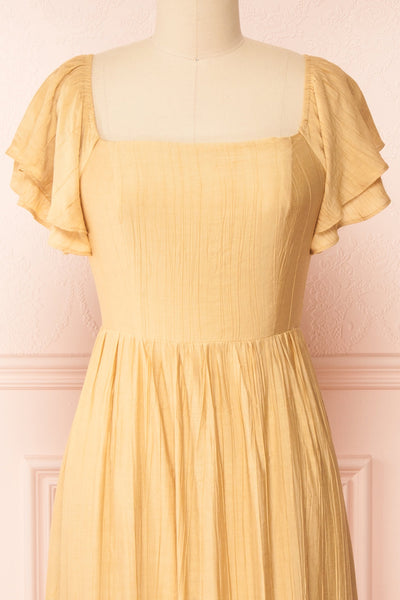 Myrtille Beige Midi Dress w/ Ruffled Sleeves | Boutique 1861 front close-up