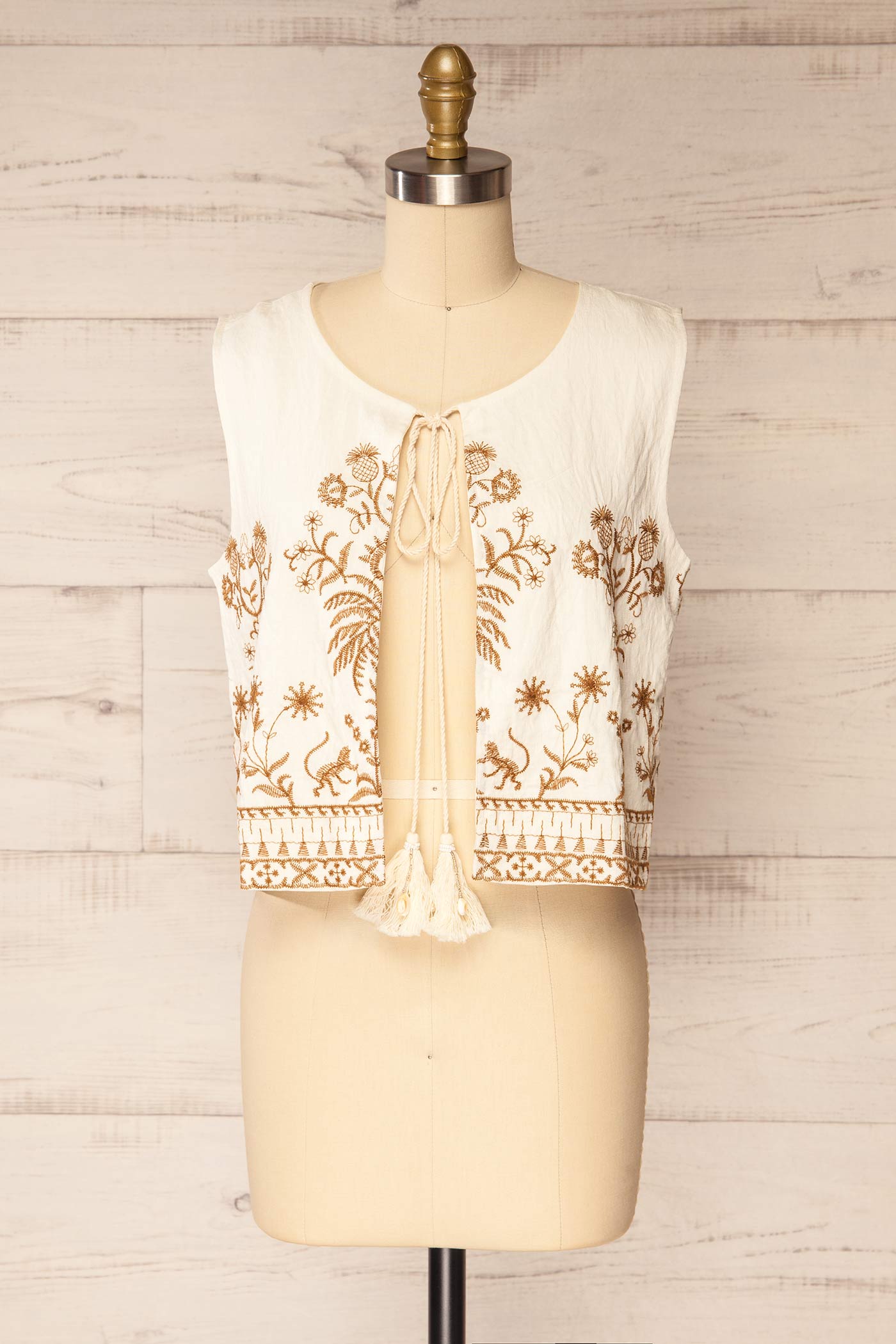 Frontview Nabha Embroidered Boho Tie-Front Ivory Top with Tassels at la petite garçonne