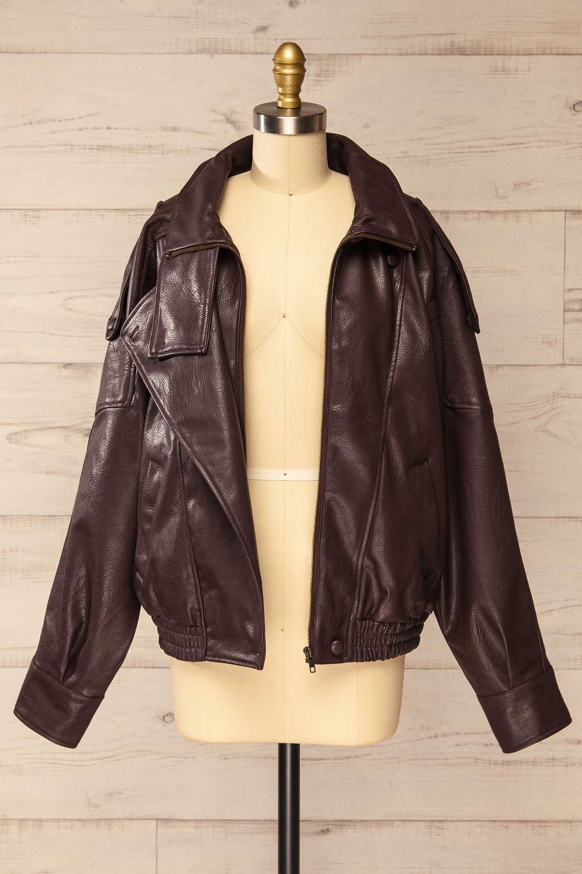 open view of Navarrenx Brown Faux Leather High Collar Jacket at La petite garçonne