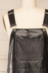 Ndjamena Black Faux Leather Overalls | La petite garçonne  front close-up