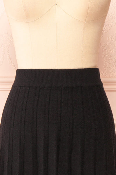 Neve Black Midi Knit Pleated Skirt | Boutique 1861 front close-up