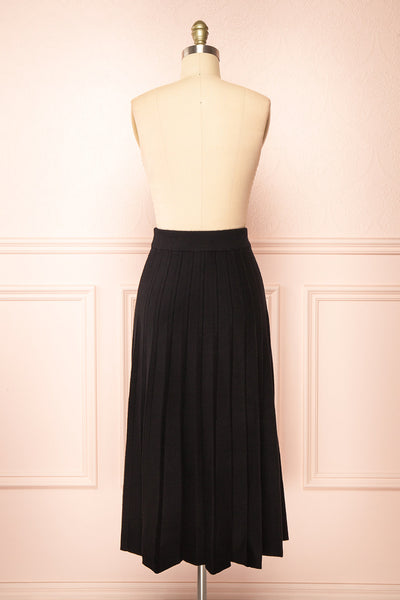 Neve Black Midi Knit Pleated Skirt | Boutique 1861 back view