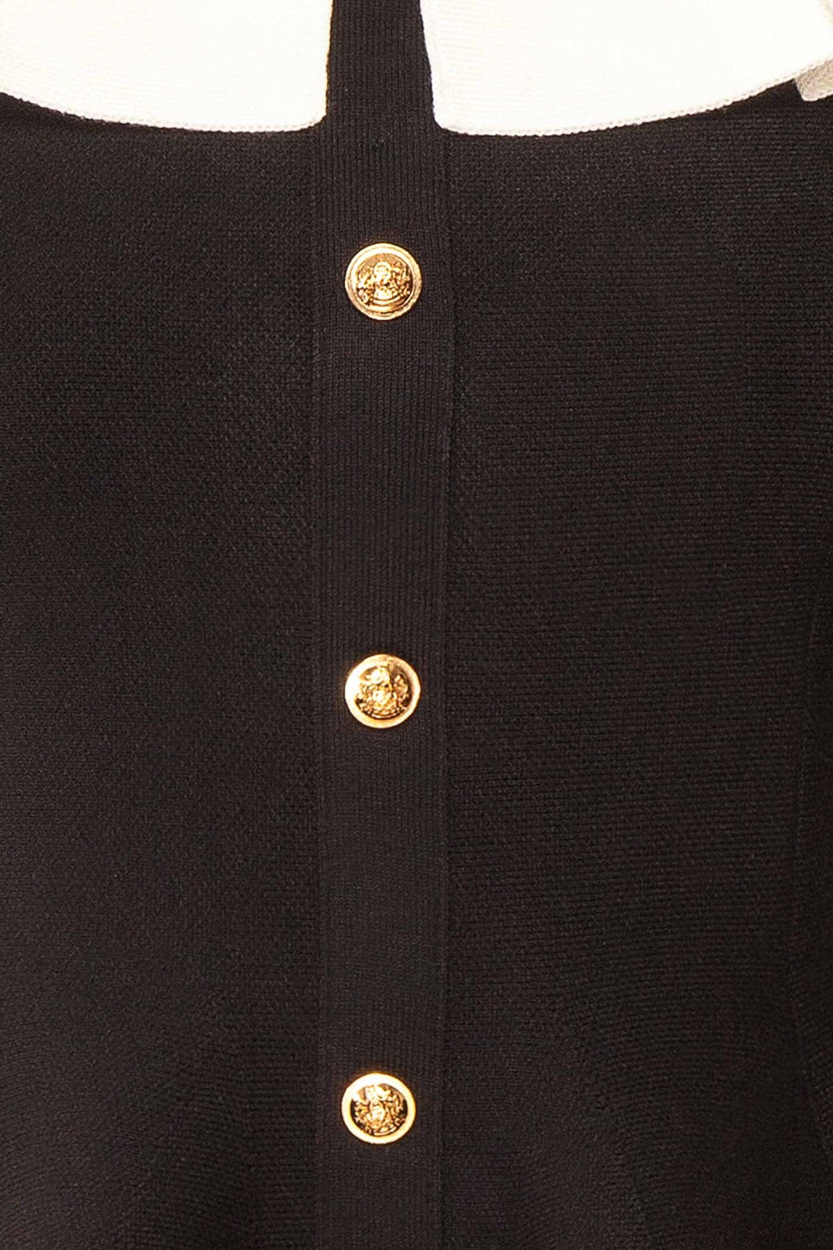 fabric view of Nuuk Black Off-the-Shoulder Peplum Top at Boutique 1861