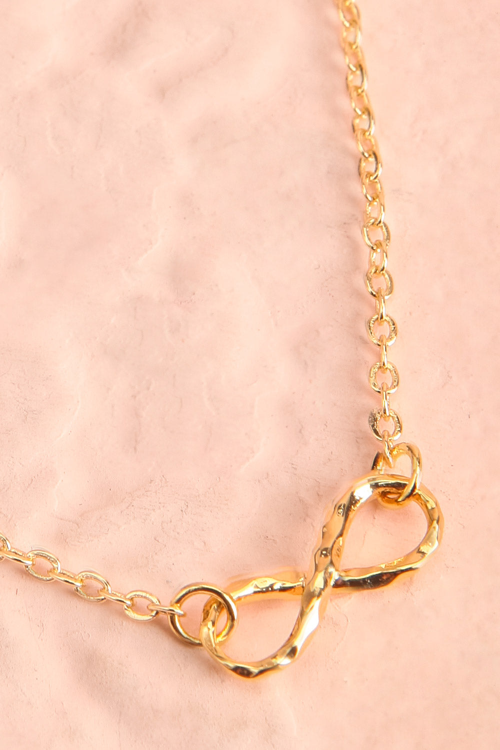 Omega Infinity Pendent Gold Necklace | Boutique 1861 flat close-up