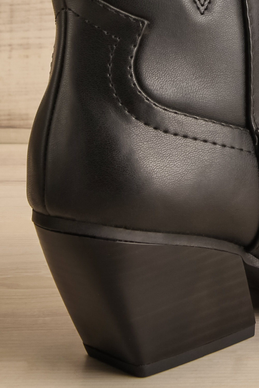 Orville Black Faux Leather Cowboy Boots | La petite garçonne heel close-up